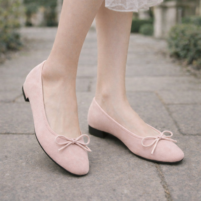 Women's suede ballerinas with a bow