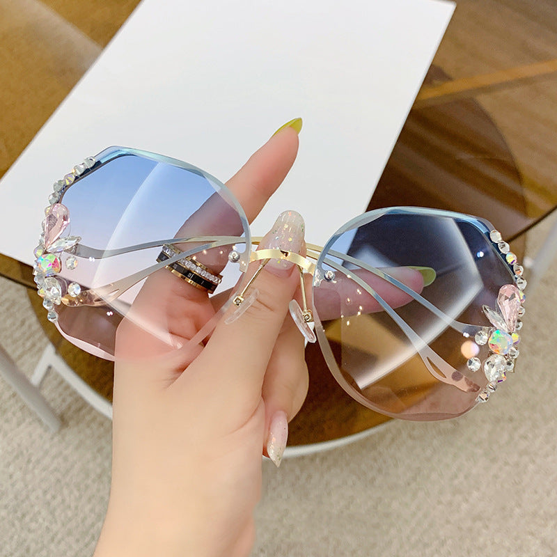 Women's titanium UV400 rhinestone sunglasses