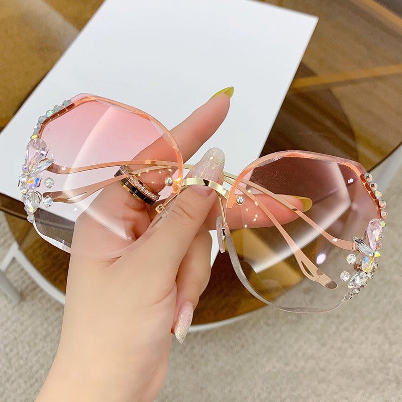 Women's titanium UV400 rhinestone sunglasses