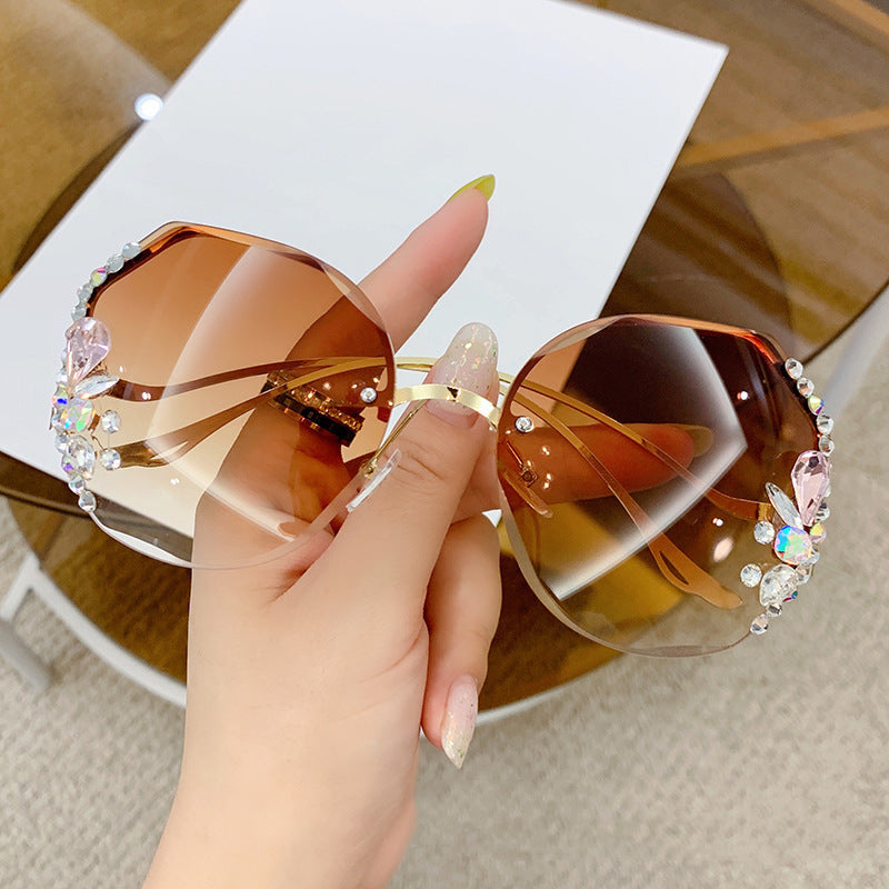 Women's titanium UV400 rhinestone sunglasses
